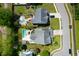 Lovely aerial view of the home featuring a pool with chairs, and well-manicured lawns at 2009 Terrabrook Ln, Charleston, SC 29412