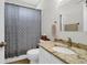 Compact bathroom featuring a toilet and a vanity with a granite countertop at 2009 Terrabrook Ln, Charleston, SC 29412