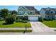 Charming two-story home with a well-manicured lawn and inviting curb appeal at 2009 Terrabrook Ln, Charleston, SC 29412