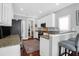 Well-lit kitchen with granite countertops, modern appliances, and hardwood floors at 2009 Terrabrook Ln, Charleston, SC 29412