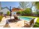 Outdoor pool area with lounge chairs and lush greenery, perfect for relaxation and enjoyment at 2009 Terrabrook Ln, Charleston, SC 29412