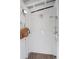 Bright and airy outdoor shower with dual shower heads and wood floor at 2009 Terrabrook Ln, Charleston, SC 29412
