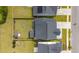 An aerial view showcases the neatly fenced backyard and neighboring houses in a well-maintained community at 206 Evergreen Ave, Summerville, SC 29485