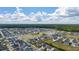 A home in a Primary-planned community with a pond, green spaces, and tree-lined streets at 206 Evergreen Ave, Summerville, SC 29485