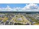 Beautiful aerial view of community featuring a central green space, pond, and meticulously planned residential layout at 206 Evergreen Ave, Summerville, SC 29485