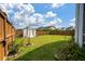 Lush backyard featuring a storage shed, a well-manicured lawn, and privacy fencing at 206 Evergreen Ave, Summerville, SC 29485
