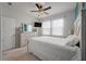 Bedroom features a white bed frame, neutral wall, and a ceiling fan at 206 Evergreen Ave, Summerville, SC 29485