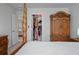 Bedroom showing closet space and a glimpse into another room at 206 Evergreen Ave, Summerville, SC 29485