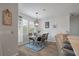 Cozy dining area featuring a wood table and chairs, set on a blue rug, creating a welcoming space at 206 Evergreen Ave, Summerville, SC 29485