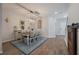 Bright dining room with wood floors, modern chandelier, and rustic décor at 206 Evergreen Ave, Summerville, SC 29485