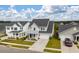 Charming two-story home with a covered front porch and well-manicured lawn, perfect for curb appeal at 206 Evergreen Ave, Summerville, SC 29485