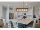 Beautiful kitchen featuring an island with bar seating, stainless steel appliances, and modern lighting at 206 Evergreen Ave, Summerville, SC 29485