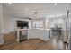 Spacious kitchen features an island with bar seating and stainless steel appliances, perfect for entertaining at 206 Evergreen Ave, Summerville, SC 29485