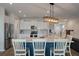 Well-equipped kitchen features center island, stainless appliances, and plenty of counter space for cooking at 206 Evergreen Ave, Summerville, SC 29485