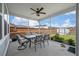 Covered porch with ceiling fan, outdoor furniture, and views of the backyard at 206 Evergreen Ave, Summerville, SC 29485