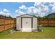 Exterior view of shed with modern design and landscaping, enhancing backyard appeal at 206 Evergreen Ave, Summerville, SC 29485