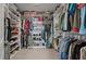 Walk-in closet with ample storage shelves, hanging space, and carpeted floor at 206 Evergreen Ave, Summerville, SC 29485