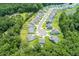 Aerial view of a well-planned residential community with green spaces and a circular street layout at 208 Cherry Grove Dr, Summerville, SC 29483