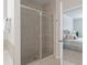 Luxurious bathroom featuring a glass-enclosed shower and a glimpse into the Primary bedroom at 208 Cherry Grove Dr, Summerville, SC 29483