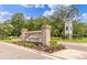 Welcome to The Ponds, where a beautiful brick entrance and tower invite you into a charming community at 208 Cherry Grove Dr, Summerville, SC 29483