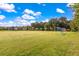 Expansive recreational field with soccer goals set against a backdrop of lush trees and a bright blue sky at 208 Cherry Grove Dr, Summerville, SC 29483