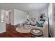 Living room with fireplace, neutral colors, lots of sunlight, and hardwood floors at 208 Cherry Grove Dr, Summerville, SC 29483