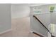Spacious loft area with plush carpet, a staircase, and plenty of natural light at 208 Cherry Grove Dr, Summerville, SC 29483