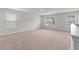 Bright and open loft area with large windows providing plenty of natural light at 208 Cherry Grove Dr, Summerville, SC 29483