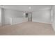 Large, open loft space with neutral carpeting, a railing, and bright natural light at 208 Cherry Grove Dr, Summerville, SC 29483