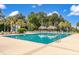 Large community pool featuring covered cabanas and ample seating, ideal for enjoying sunny days and leisure activities at 208 Cherry Grove Dr, Summerville, SC 29483