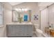 Bathroom features a double sink vanity, walk-in shower, and tiled floors at 2096 Promenade Ct, Mount Pleasant, SC 29466