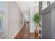 Inviting entryway with hardwood floors and elegant wainscoting at 2096 Promenade Ct, Mount Pleasant, SC 29466