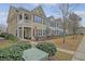Charming townhomes feature front porches, upper balconies, and well-maintained landscaping at 2096 Promenade Ct, Mount Pleasant, SC 29466