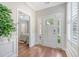 Beautiful foyer with hardwood floors, wainscoting and view to bedroom at 2096 Promenade Ct, Mount Pleasant, SC 29466