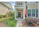 Charming townhome exterior with well-manicured landscaping and a welcoming entrance at 2096 Promenade Ct, Mount Pleasant, SC 29466