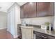 Office area with built-in cabinets and a granite countertop at 2096 Promenade Ct, Mount Pleasant, SC 29466