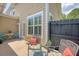 Inviting patio area with comfortable seating and a charming outdoor ambiance perfect for relaxing and entertaining at 2096 Promenade Ct, Mount Pleasant, SC 29466