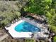 Overhead view of the gated community pool, surrounded by lounge chairs and shade trees at 2134 Landfall Way, Seabrook Island, SC 29455