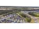 Aerial view of the community showcasing lush greenery, winding roads, and scenic ponds at 214 Squire Pope Rd, Summerville, SC 29486