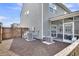 A fenced backyard features wood fencing, an air conditioning unit, and a screened-in porch at 214 Squire Pope Rd, Summerville, SC 29486