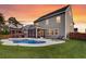 Beautiful backyard with a private pool, screened porch, and well-maintained lawn at 214 Squire Pope Rd, Summerville, SC 29486