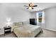 Bright bedroom featuring a queen bed, dresser, and neutral decor at 214 Squire Pope Rd, Summerville, SC 29486
