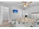 Spacious bedroom with ample natural light, ceiling fan, and walk-in closet at 214 Squire Pope Rd, Summerville, SC 29486