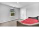 Bright bedroom with a cozy daybed and a window overlooking the trees at 214 Squire Pope Rd, Summerville, SC 29486