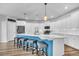 Beautiful kitchen with a large island, modern stainless-steel appliances, and stylish pendant lighting at 214 Squire Pope Rd, Summerville, SC 29486