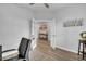 Cozy home office featuring natural light, open French doors, and stylish decor at 214 Squire Pope Rd, Summerville, SC 29486