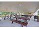 A covered picnic area offers ample seating with picnic tables and ceiling fans at 214 Squire Pope Rd, Summerville, SC 29486