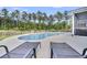 Beautiful pool area with lounge chairs, perfect for outdoor relaxation and entertainment at 214 Squire Pope Rd, Summerville, SC 29486