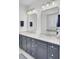 Bathroom with double vanity, granite countertops, and modern fixtures at 2194 Cultura Cir, Mount Pleasant, SC 29466