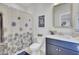 Bathroom featuring a shower-tub, vanity with storage, and a stylish mirror, offering a functional space at 2194 Cultura Cir, Mount Pleasant, SC 29466